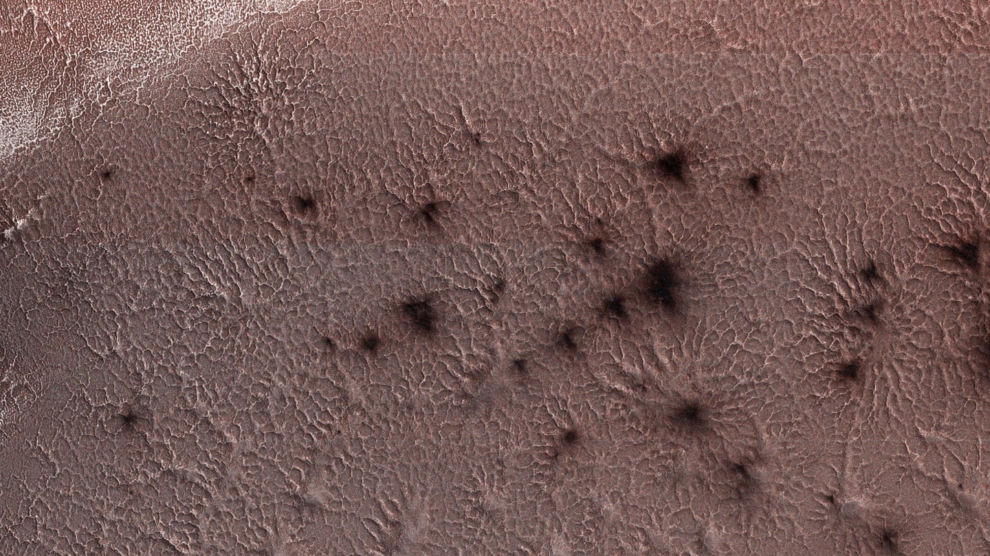 "Mars spiders," formations caused by underground carbon dioxide fizzing to the surface in springtine.