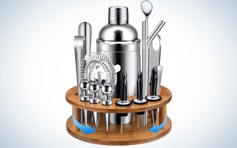 Cocktail Shaker Set with 9 items on it on silver color and with bamboo rotating stand wooden bar set tools.