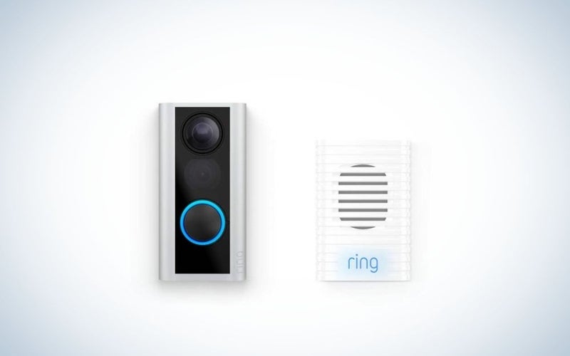 black and silver doorbell camera with white Ring chime