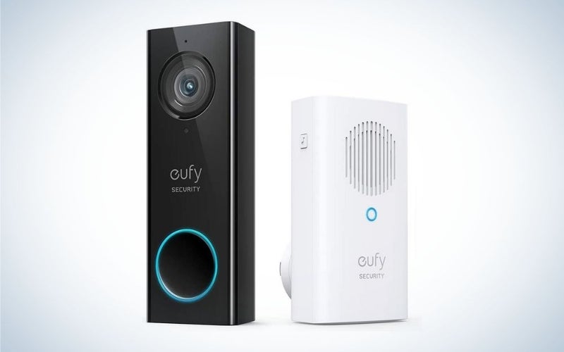 black doorbell camera with white eufy chime