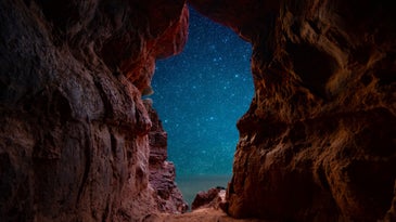 Stars seen from a cave.