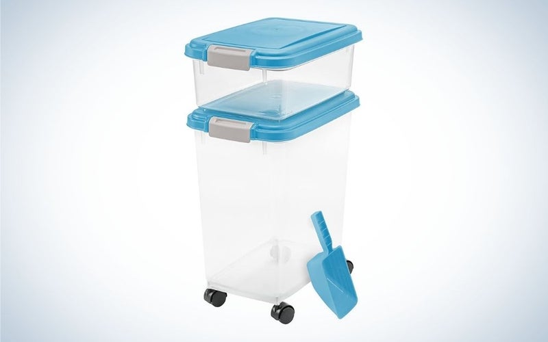 Clear pet airtight food containers with blue lids and blue food scoop