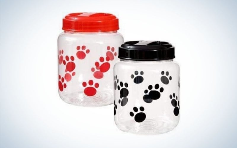 Two pet food containers, one with red paw prints and one with black paw prints