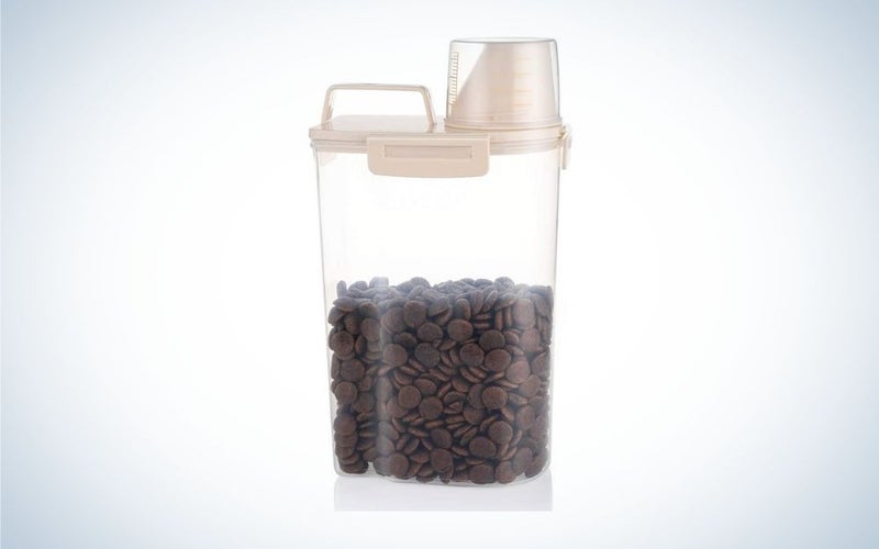 Beige pet food container with measuring cup