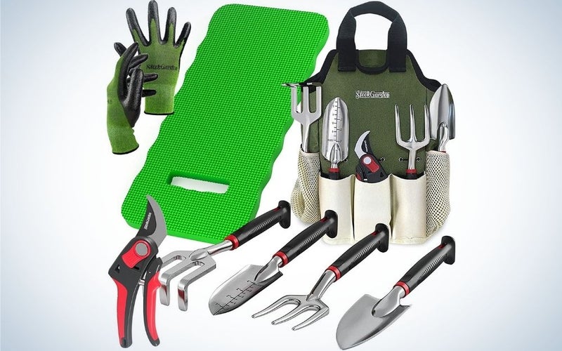 8 piece set of gardening tools from front that include green gloves and knee pad, aluminum hand tools with black and red handles and a garden tote.