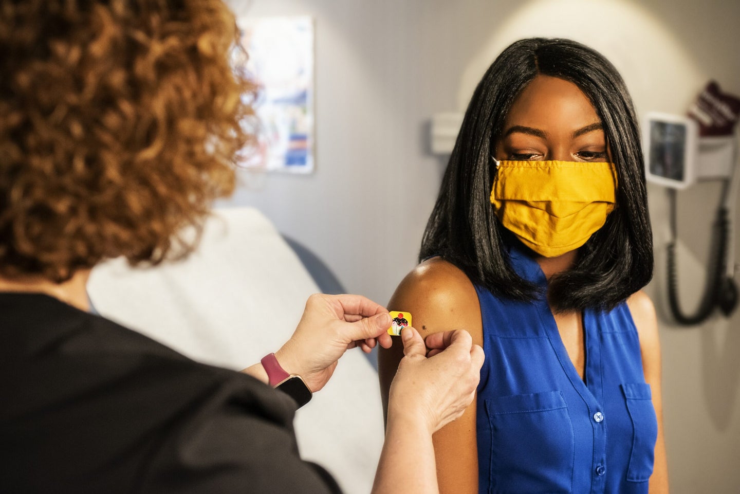person getting a covid-19 vaccine