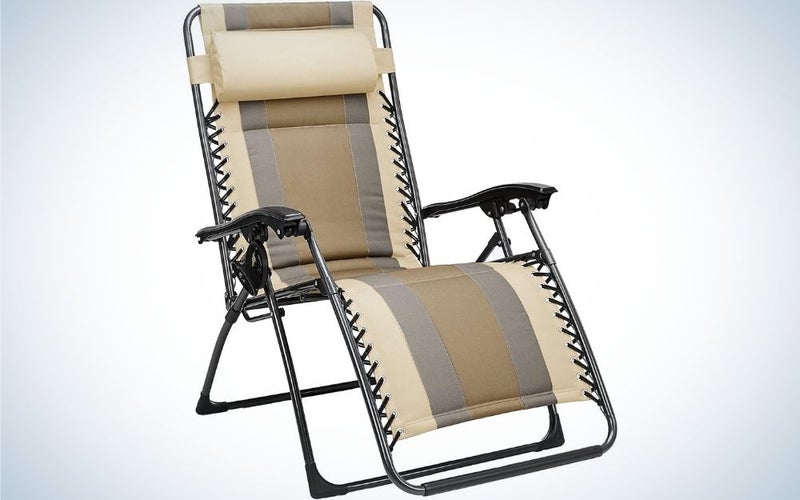 A relaxing outdoor chair with beige and brown colors with two hand supporters and a neck support.