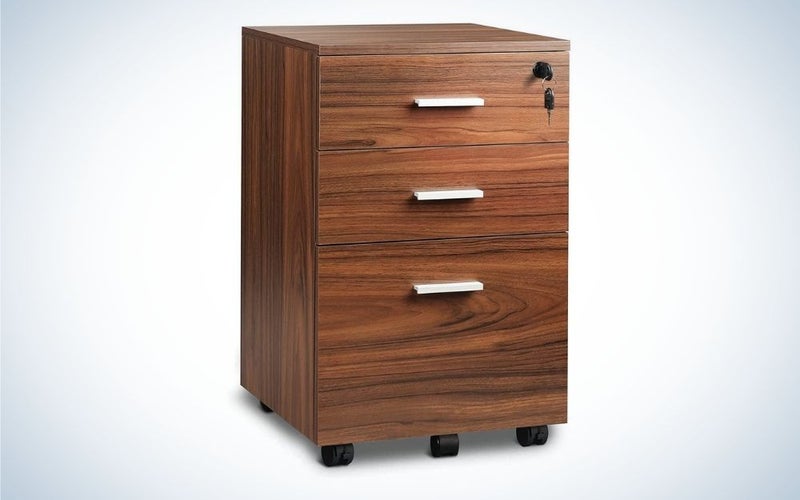 Wood file cabinet with three drawers and lock on the top drawer