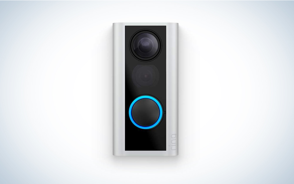 A Ring peephole camera on a blue and white background