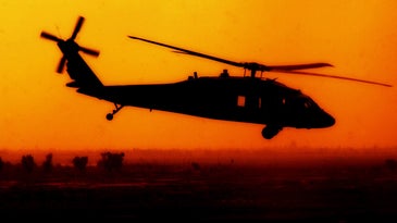 A flying Black Hawk helicopter in Iraq.
