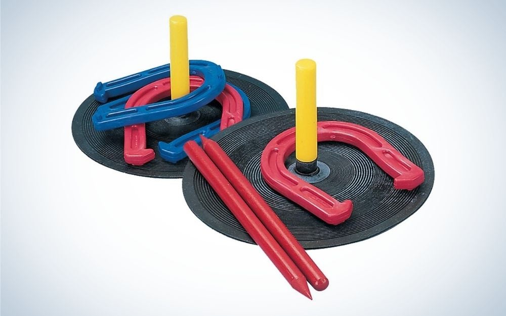 Horseshoes, mats with pegs and dowels backyard game