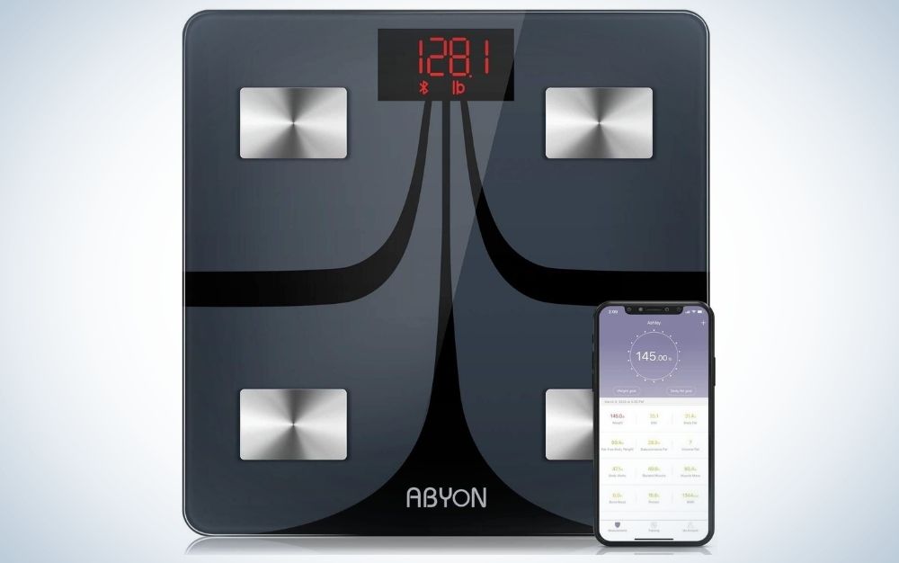 Digital home gym scale and the weight showing on it