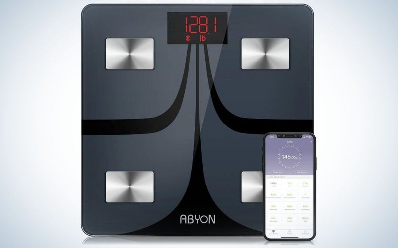 Digital home gym scale and the weight showing on it