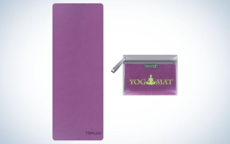 Thin, purple, foldable yoga mat
