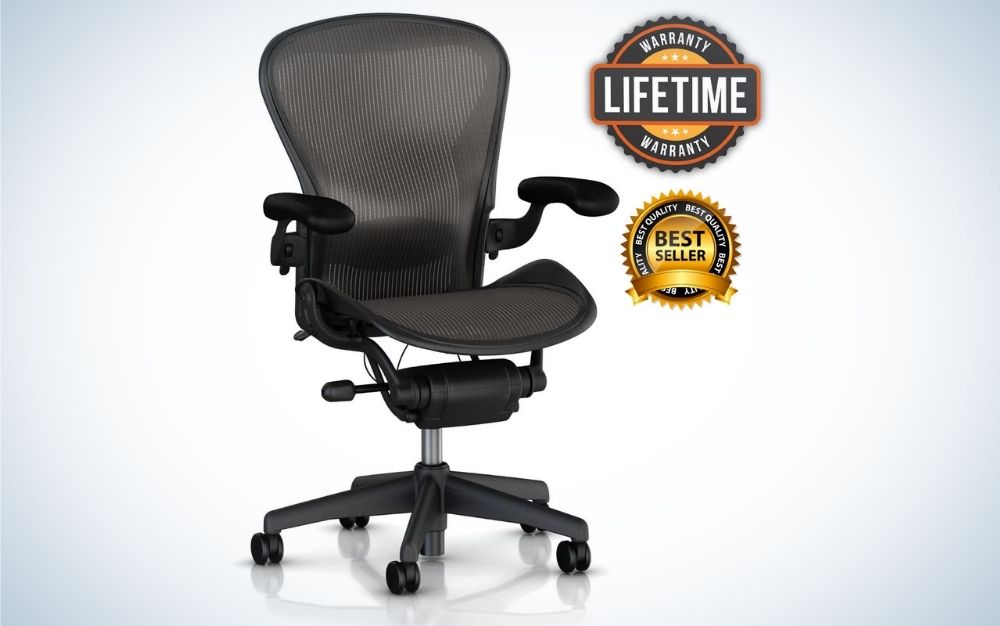 A black office chair with black sliding wheels and chair support a translucent mesh.