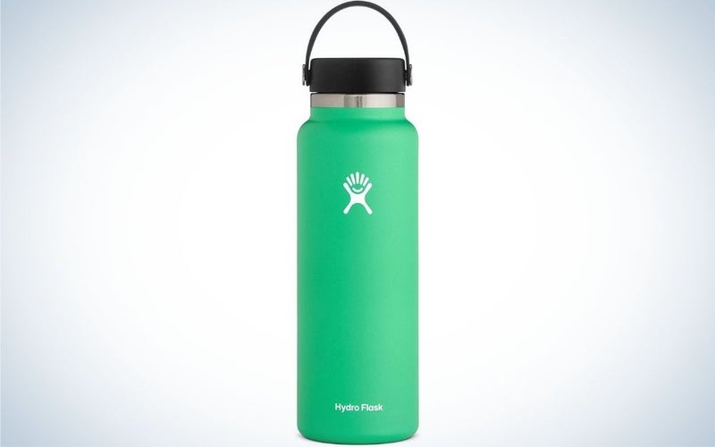 A light blue color water bottle with a black lid.