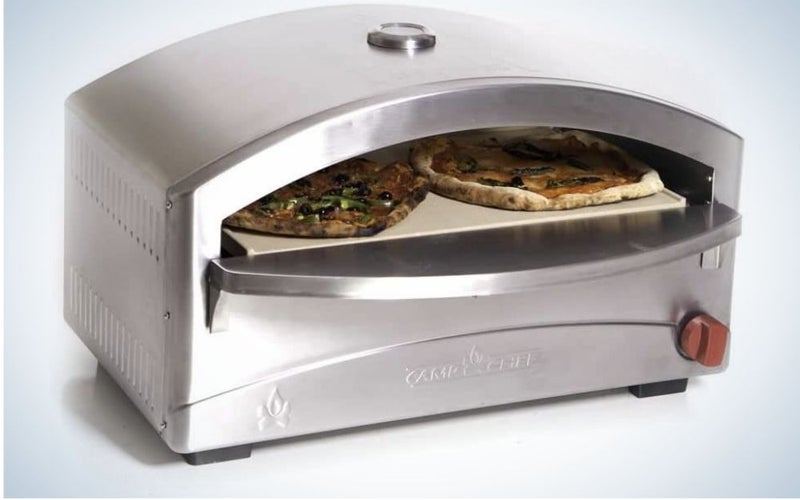 A silver pizza oven all rectangular in shape and with space between it with two pizzas inside and stainless steel oven.