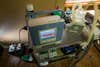 Ventilator for muscular dystrophy hooked up to back- battery in a house