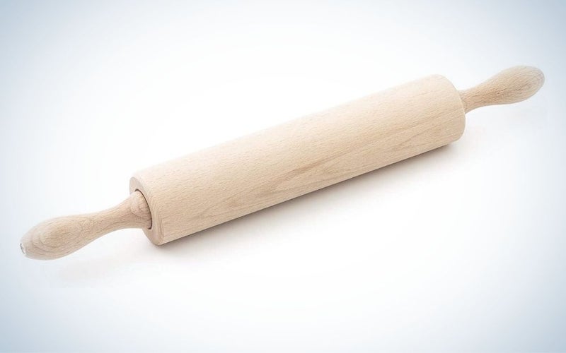 Beige wood rolling pin with revolving Centre