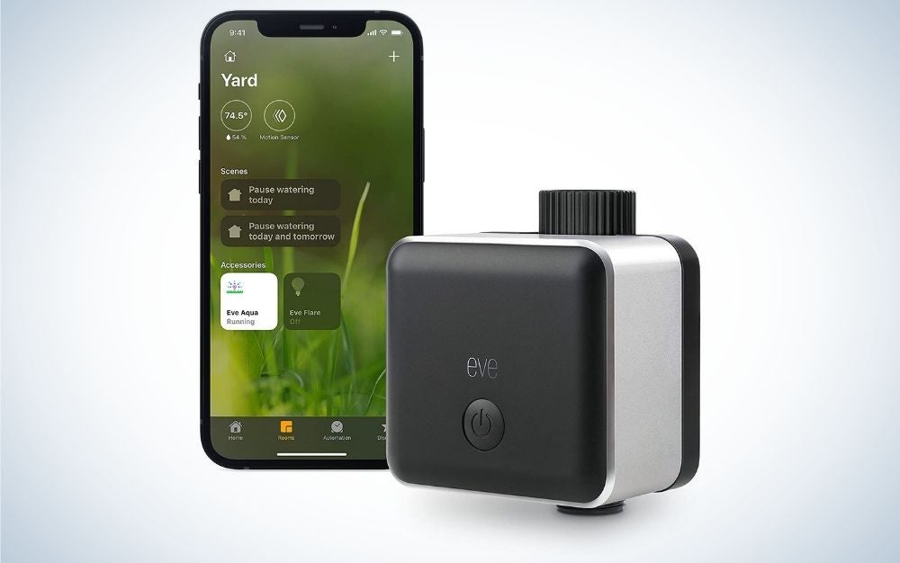 Black and gray smart sprinkler controller automated with apps on the phone
