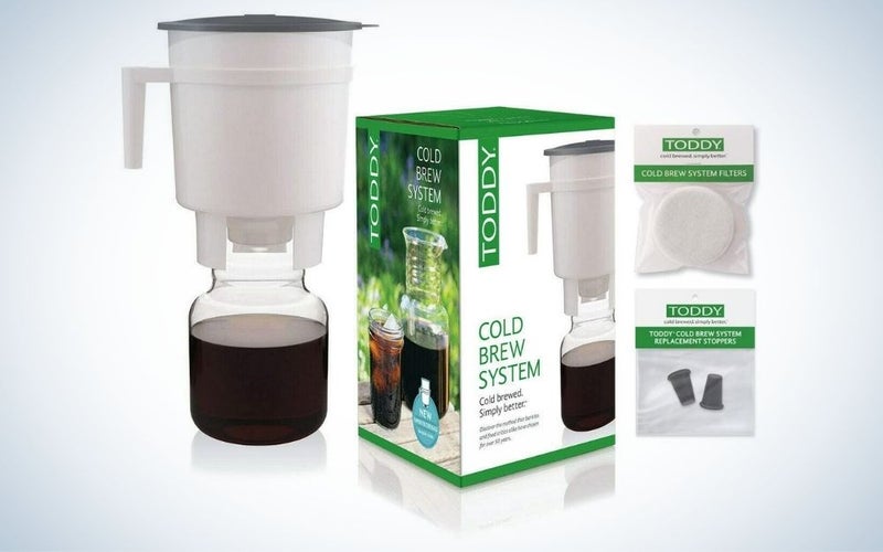White plastic and glass cold brew coffee maker with extra filters and silicone stoppers bundle