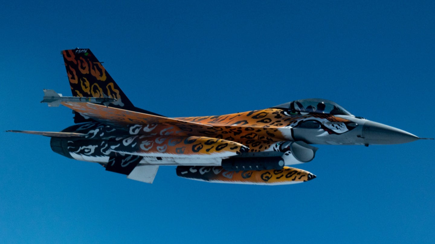 Portuguese F-16 fighter plane with orange tiger design