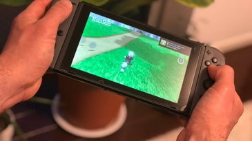 Nintendo Switch handheld running Mario Odyssey
