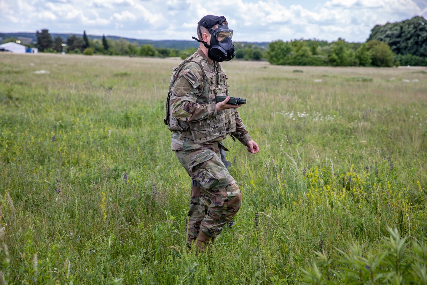 A solider with a Joint Chemical Agent Detector, or JCAD, in May, 2021.
