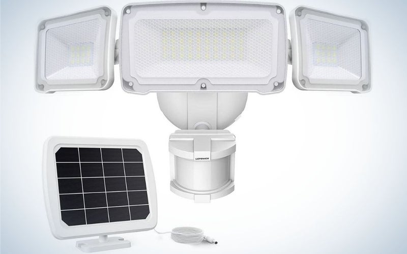 A white machine all that functions as a solar and receives light from the sun and is a light with sensor at night to protect the environment from suspicious movements.