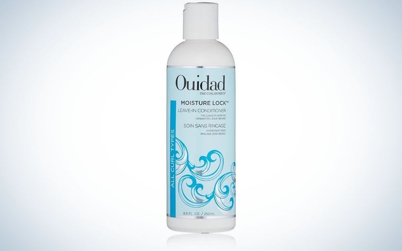 Bottle of ouidad leave-in conditioner for curly hair
