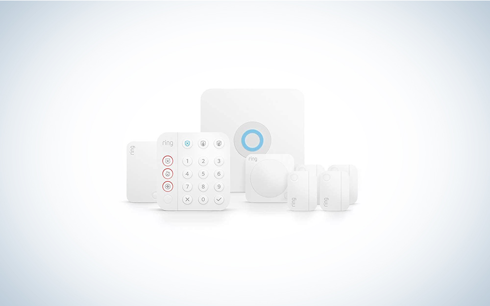 A Ring Alarm 8-piece home security system package on a blue and white gradient background