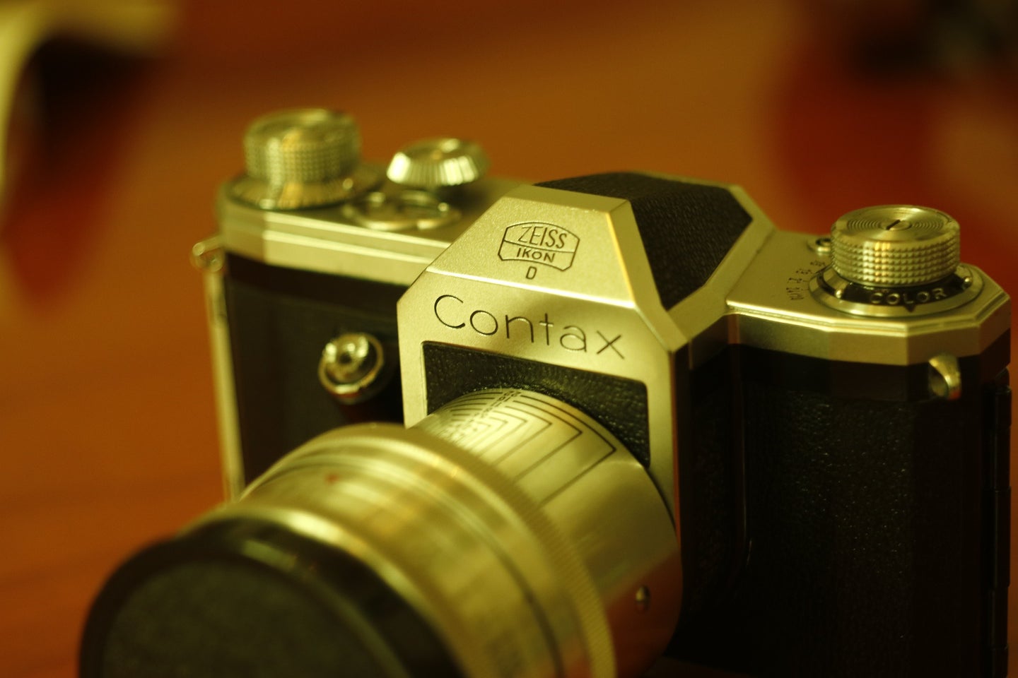 Vintage Contax camera on wooden table