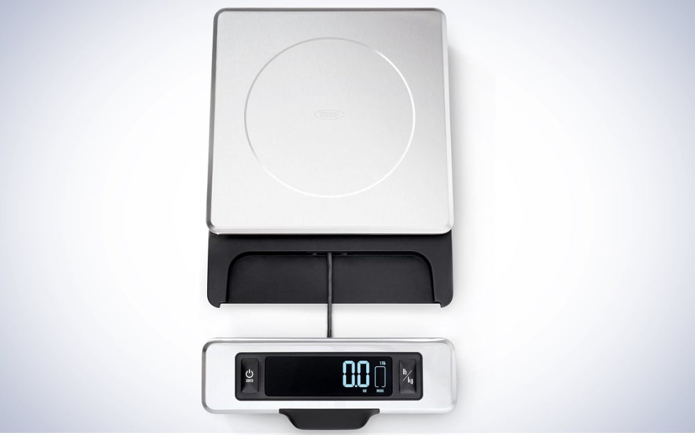 OXO Good Grips 11-Pound Stainless Steel Food Scale with Pull-Out Display on a plain white background.