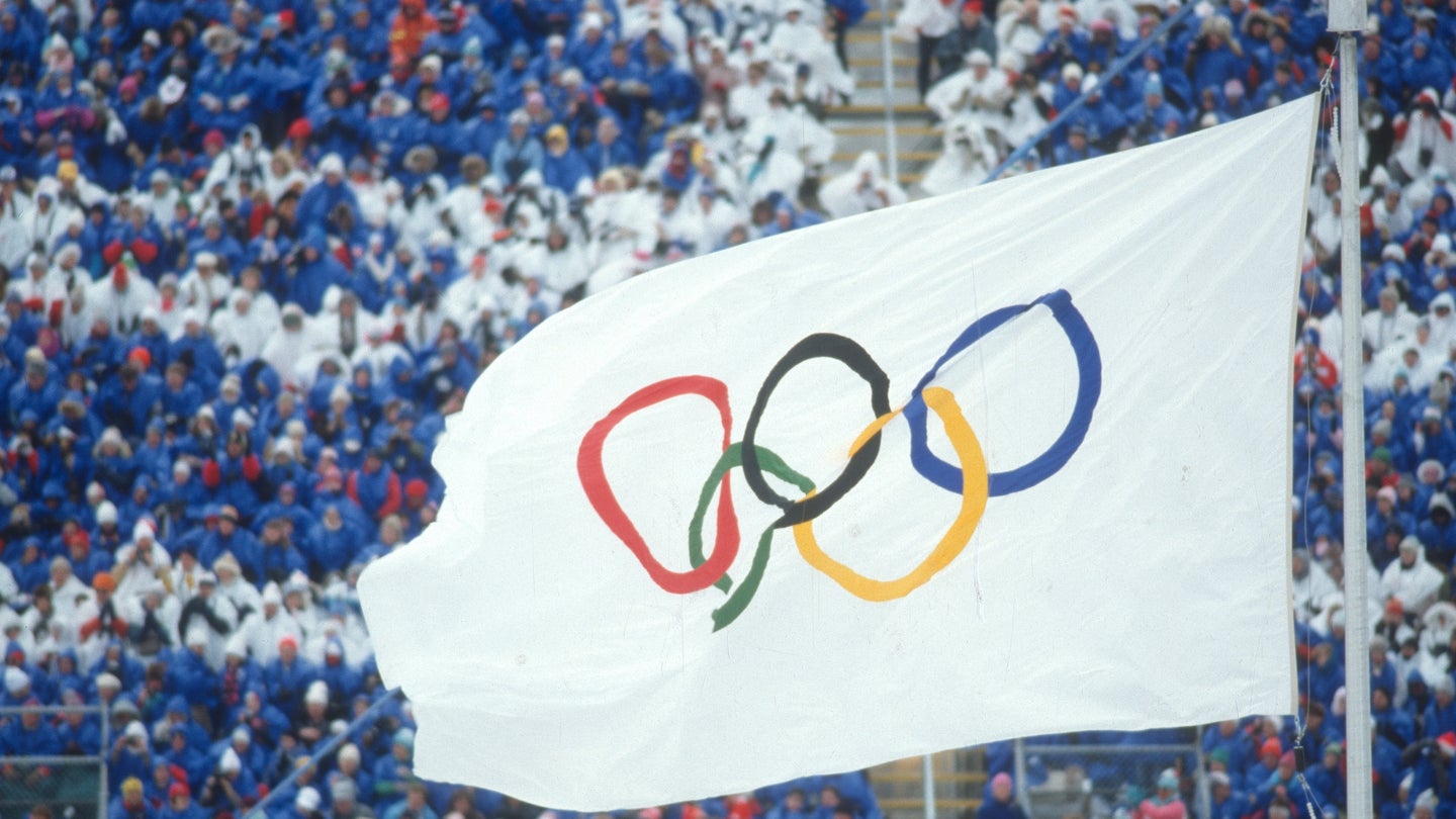 White Olympics five-ring flag flying during the 1988 summer games in Seoul