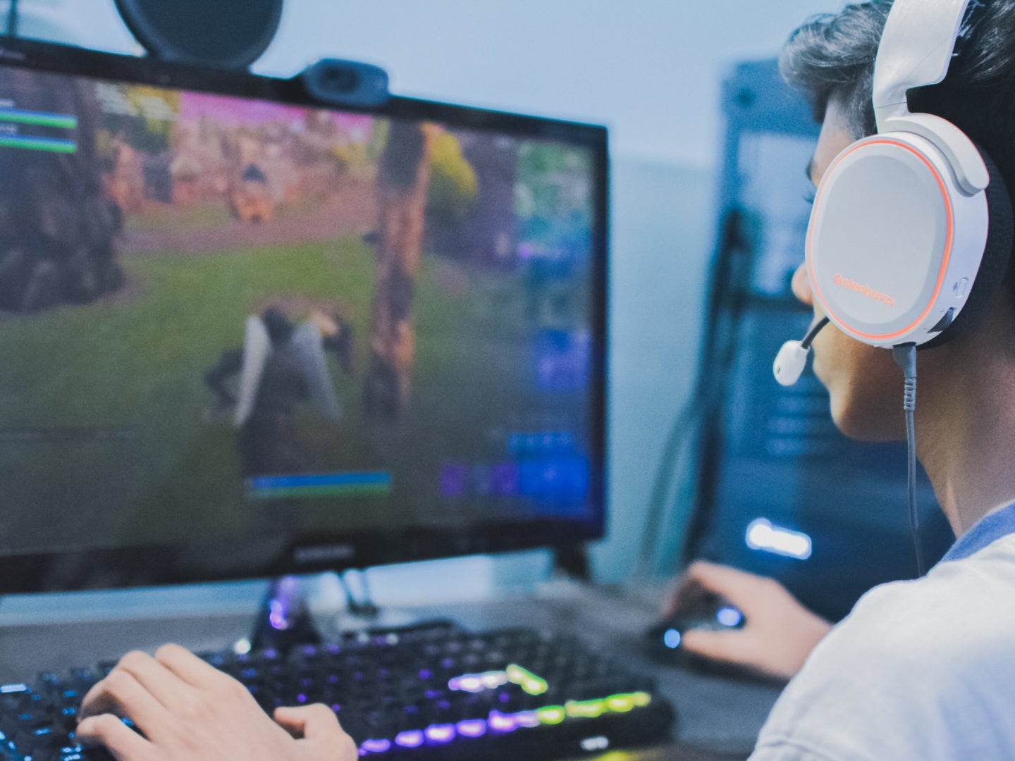 A person playing Fortnite on a computer.