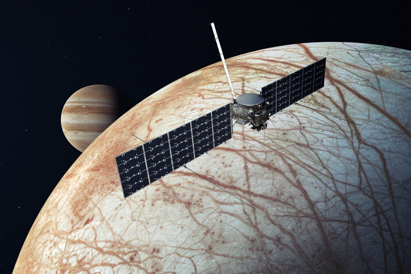 An artist's interpretation of the Europa Clipper spacecraft as it orbits Jupiter's frozen moon Europa.