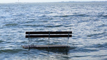 flood waters surrounding a bench