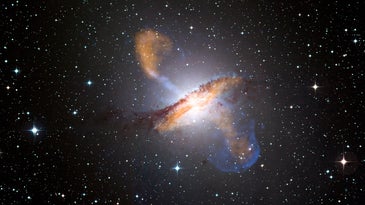 A supermassive black hole inflates massive lobes, visible here in X-rays, above and below the Centaurus A galaxy.