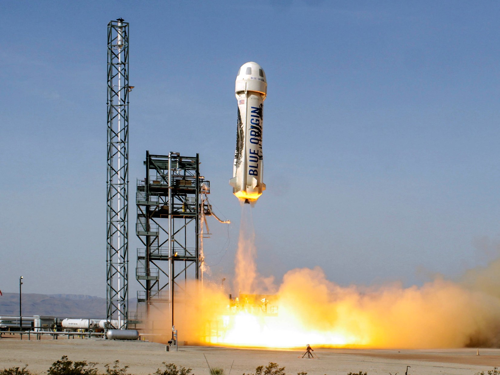 A Blue Origin New Shepard, pictured above during a test flight, carried a paying passenger for the first time today. 