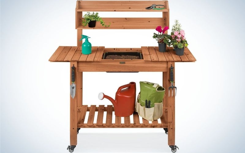 Mobile garden potting bench with garden equipment