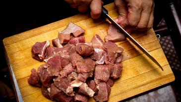 Raw meat on a wooden cuttingboard