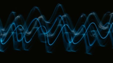 blue sine waves on a black background