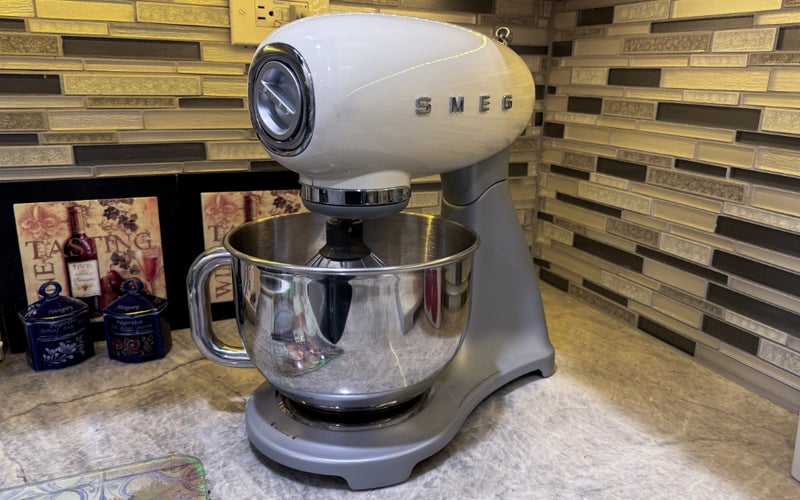 Smeg's 50's Retro Stand Mixer on a kitchen counter.
