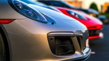 Porsches in rental car lot