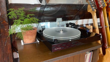 Fluance RT85 turntable on a stand