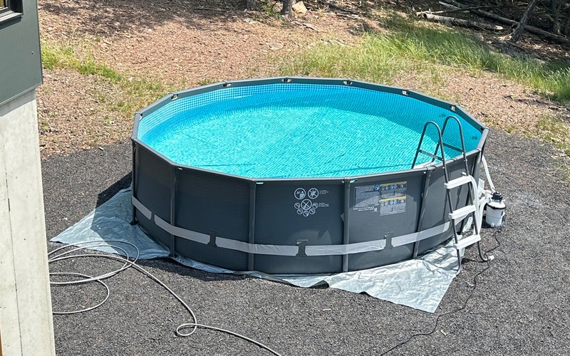 Intex Ultra XTR Frame above ground pool in a yard from above
