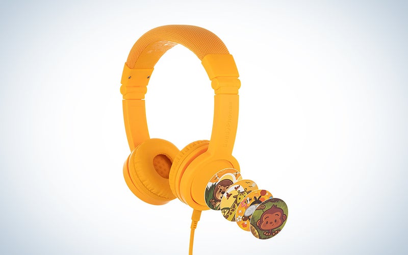 A pair of yellow headphones on a blue and white gradient background