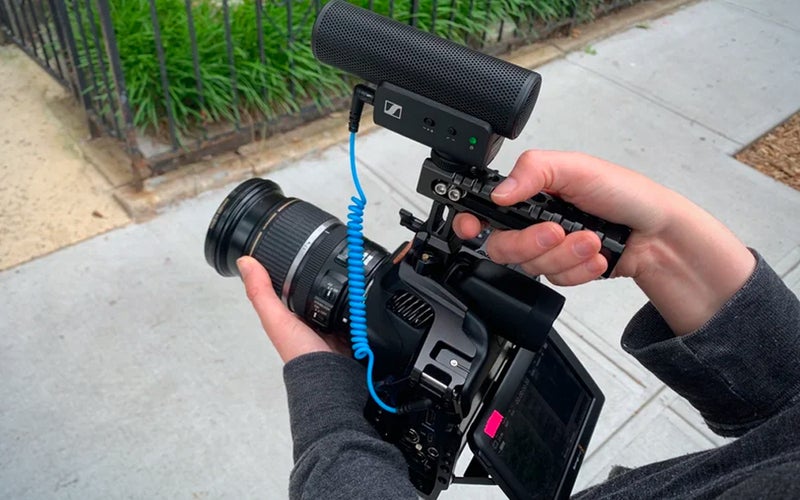 Sennheiser MKE 400 microphone attached to a video camera
