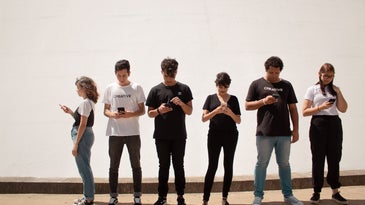 teens texting on smartphone