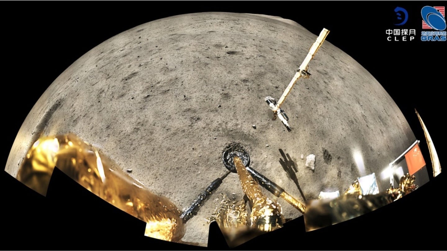 A wide-angle picture of the surface of the moon from the perspective of a lander spacecraft.